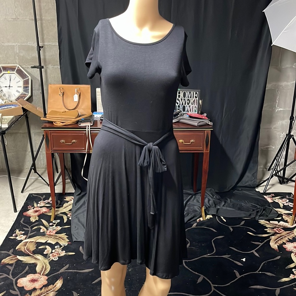 Francesca’s black dress